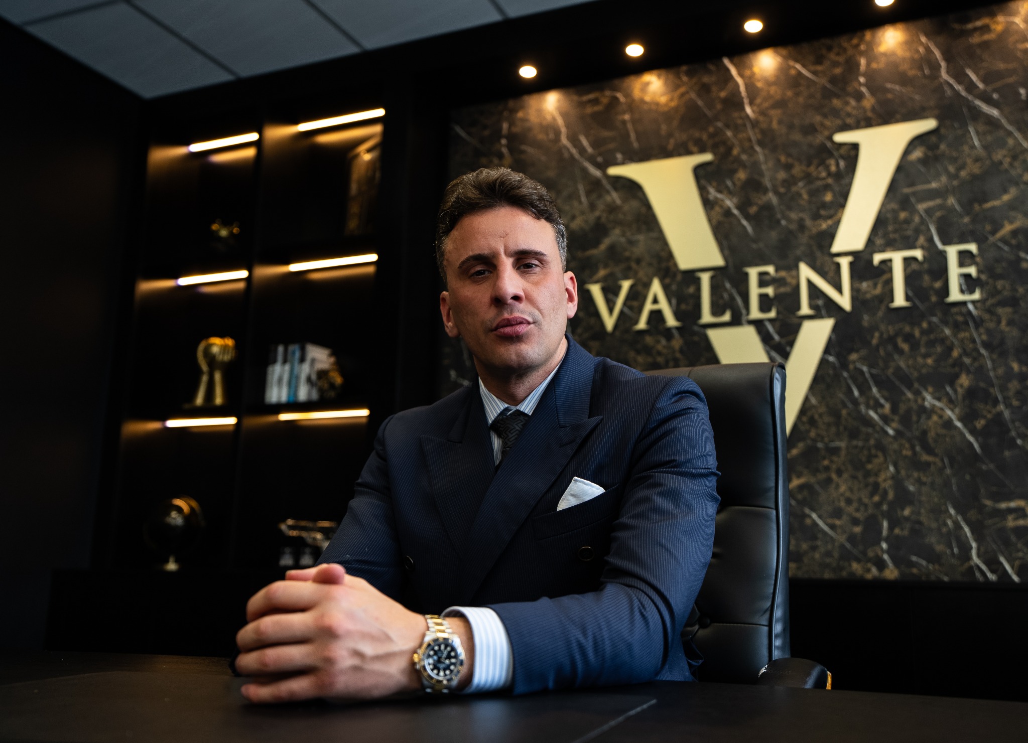 Joseph Valente seated in the Valente boardroom